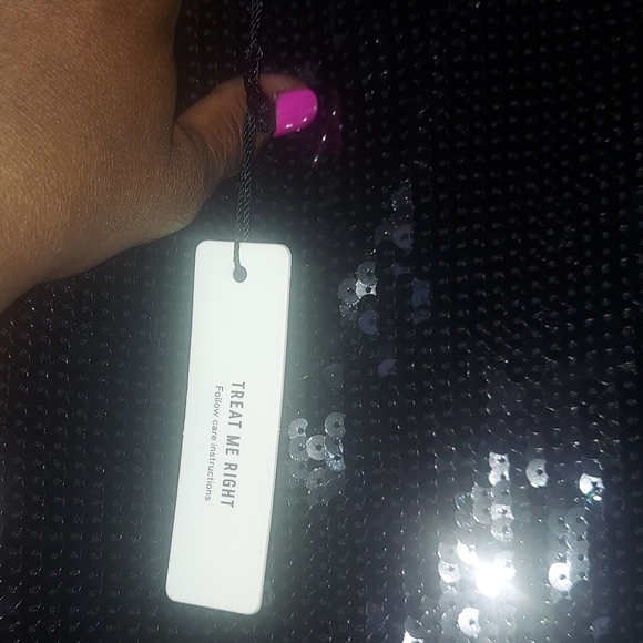 EXPRESS fav Black sequin stretchy midi skirt with feather detail at bottom - Picture 9 of 11